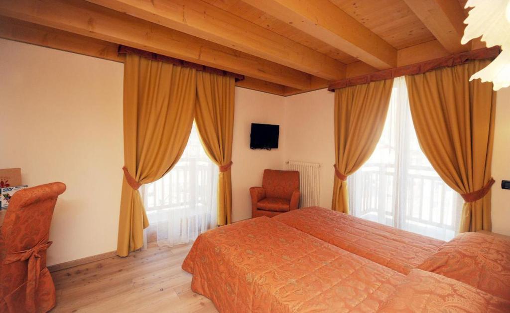Residence Garni Il Giglio Commezzadura Habitación foto